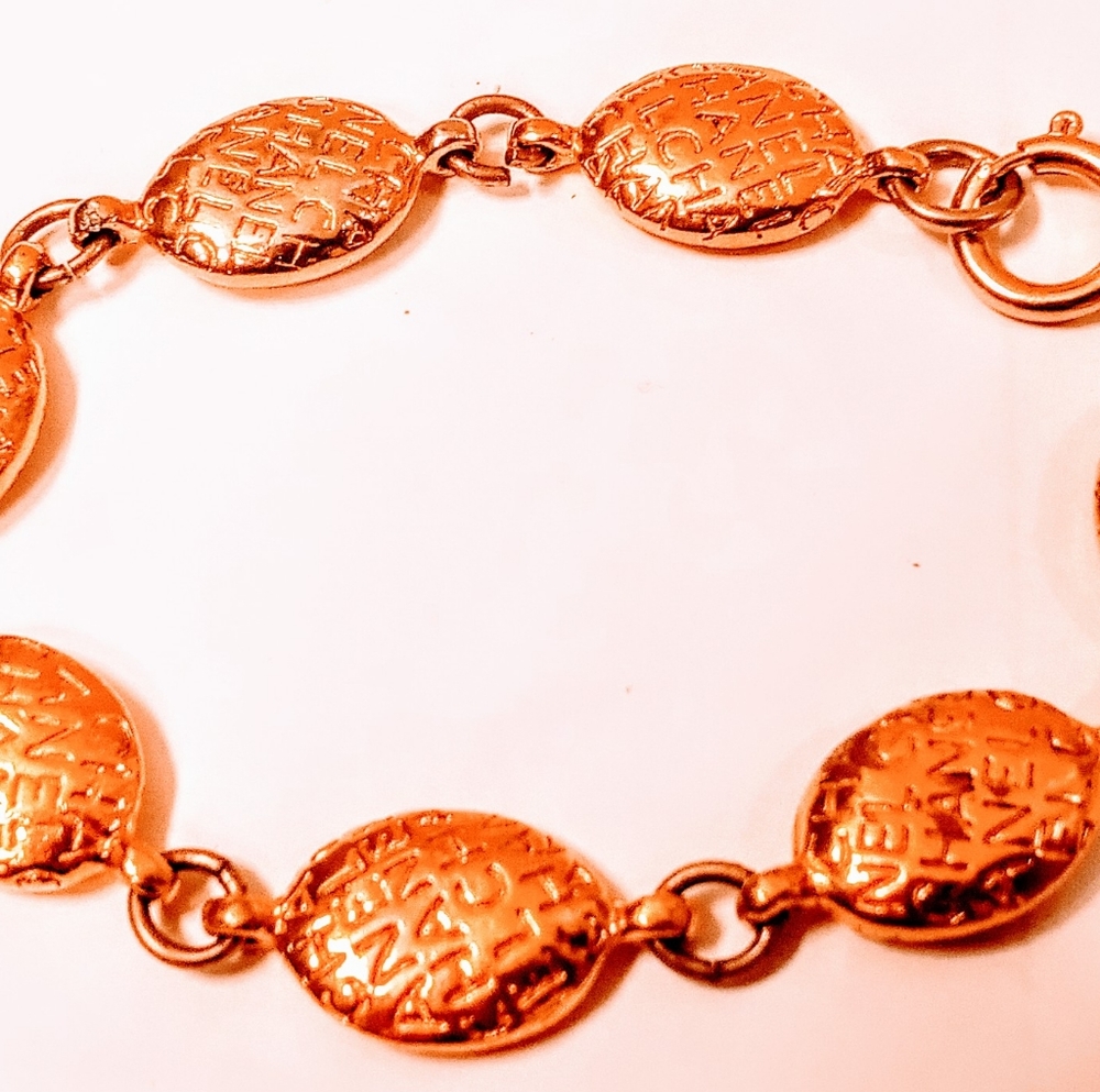 Authentic Vintage Chanel Gold Oval Medallions / Charms Repeating Logo Bracelet
